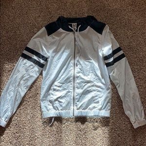 Whitish blue wind breaker